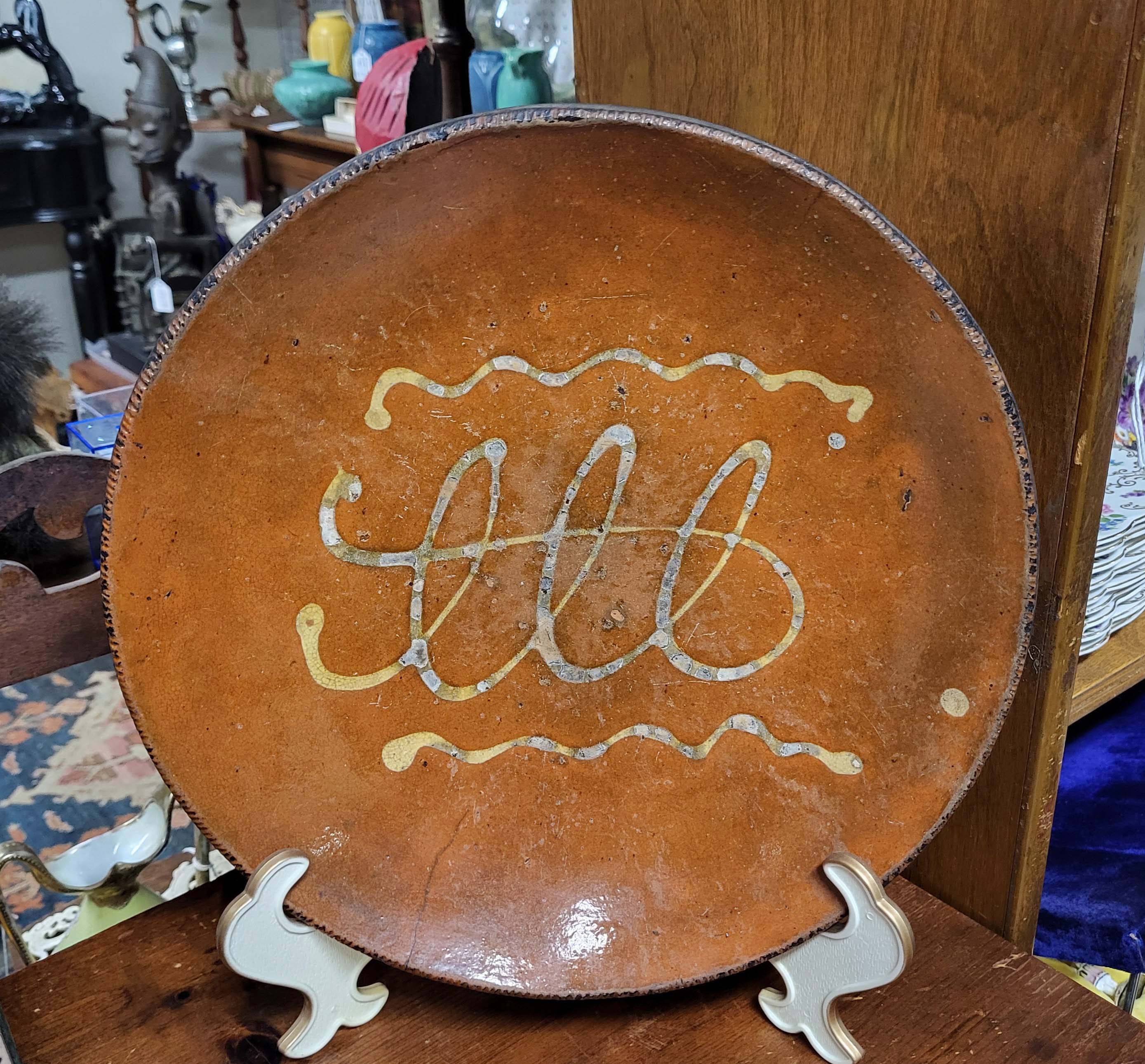 SLIP DECORATED REDWARE CHARGER